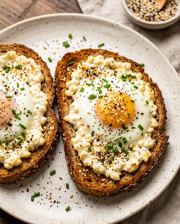 Crispy cottage cheese toast with egg and everything bagel seasoning on golden whole wheat bread made in the air fryer.